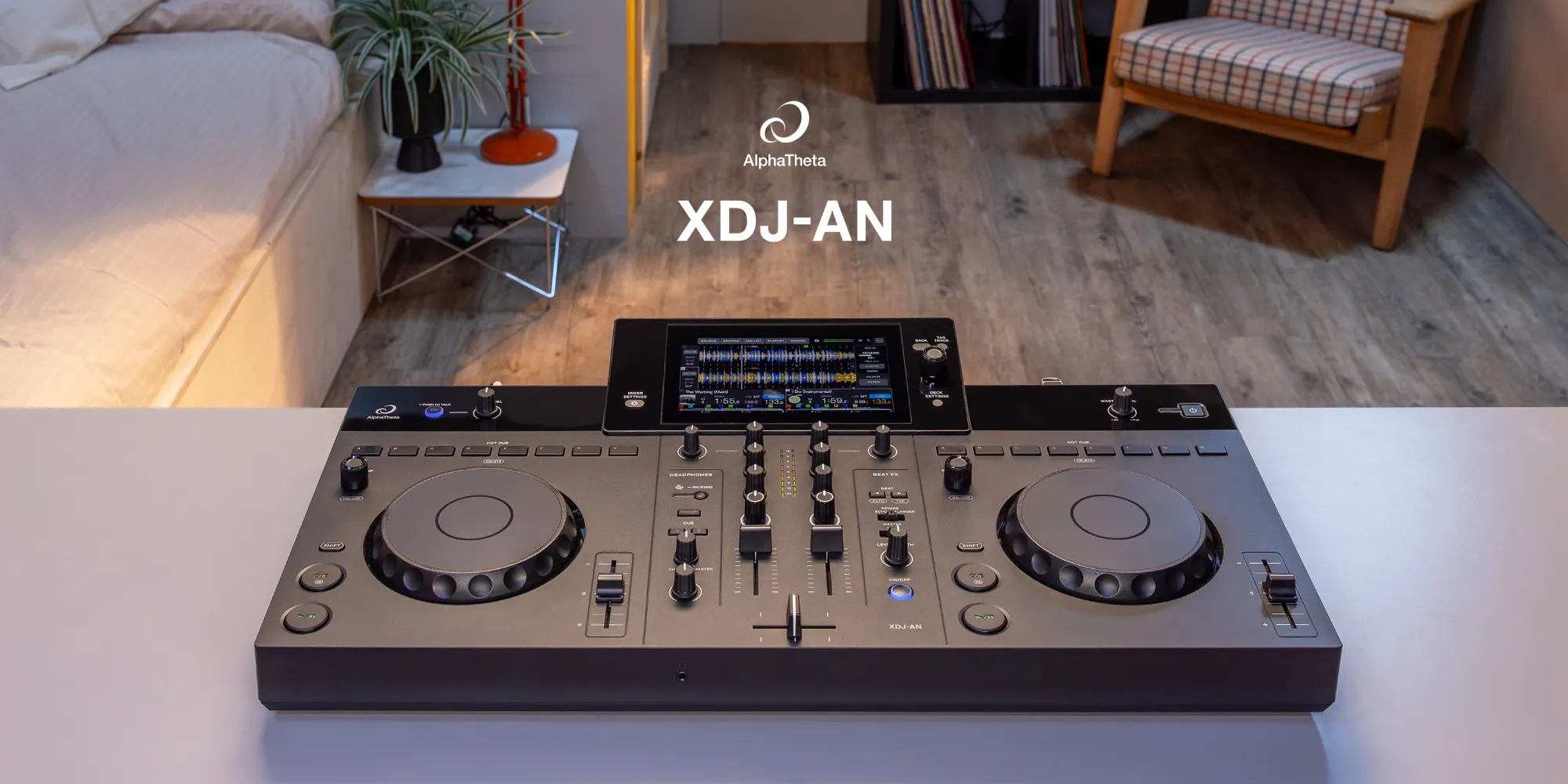 All-in-one DJ controller set up on a desk in a home listening room